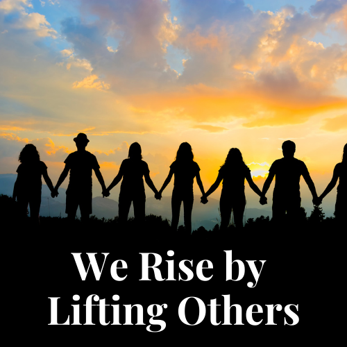 a group of people holding hands
