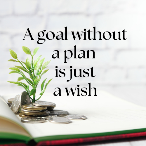 a stack of coins and a plant on top of a book